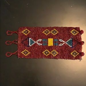 Beaded cuff bracelet in red with yellow & blue